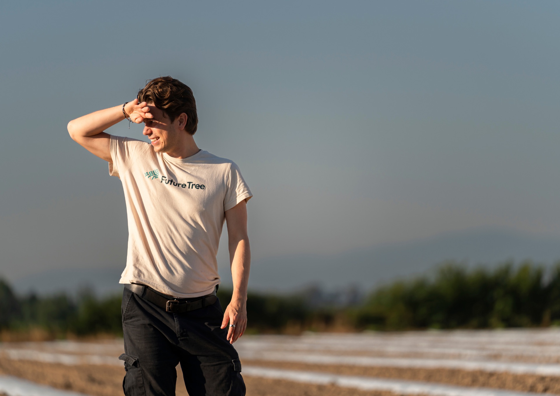 FutureTree team member surveying a plantation